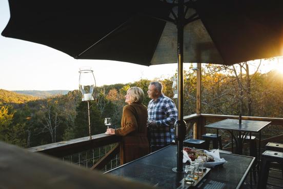 couple on back deck at bear creek winery branson