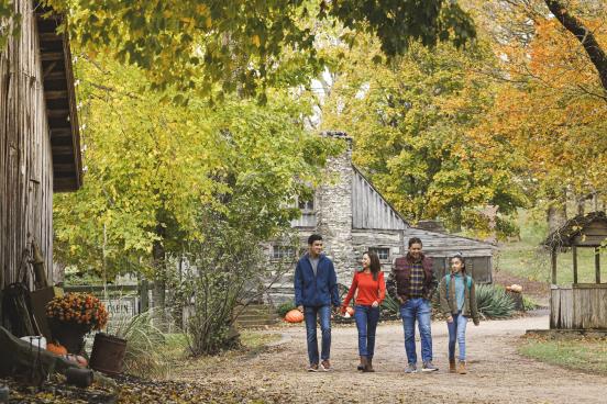 A family walks around Shepherd of the Hills