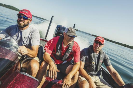 Three men on a boat