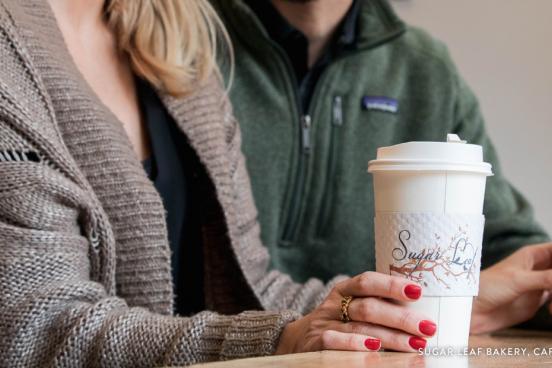 Couple on a coffee date at Sugar Leaf Coffee Shop