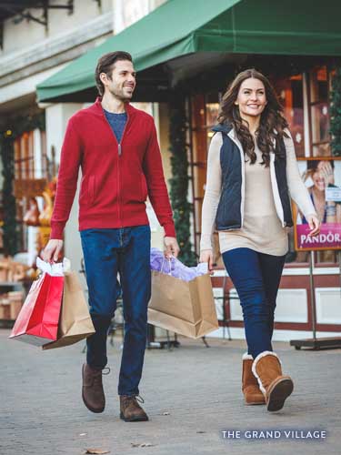 Couple shopping at The Grand Village.