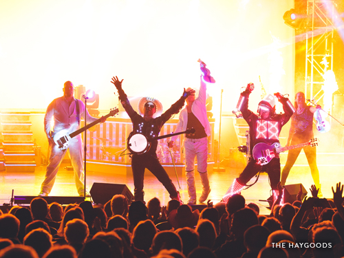 Family band performing on Branson live show stage.