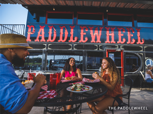 Family eating at the Paddlewheel for New Year's Eve.